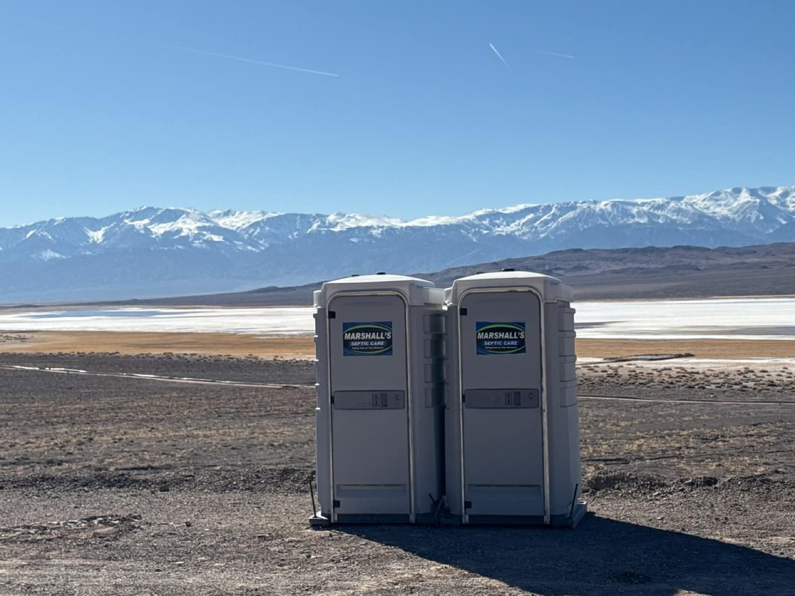 Marshall's portable sanitation service truck on a Northern Nevada job site